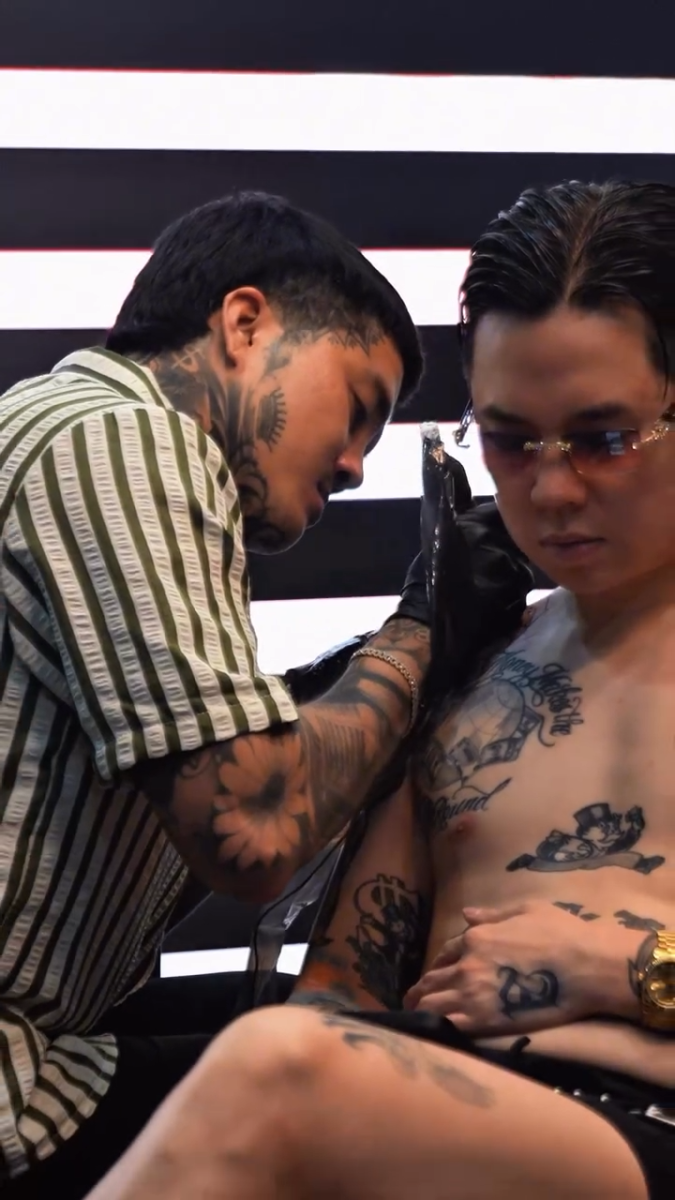 Modern and clean interior of QV Tattoo Studio in District 3, Ho Chi Minh City.