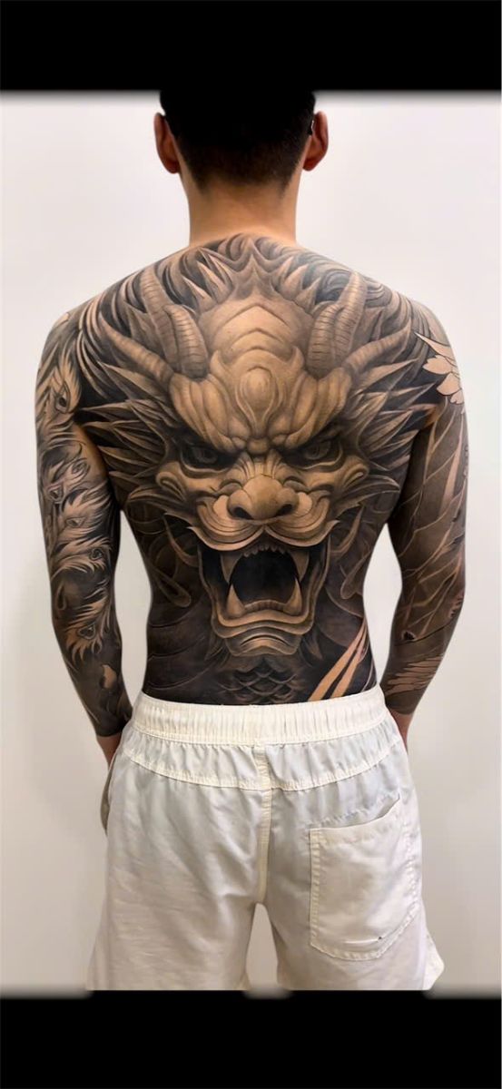 Bold tribal-inspired Blackwork tattoo by professional artist at Tattoo Studio District 3